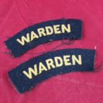 Pair of wartime warden shoulder titles (cloth)