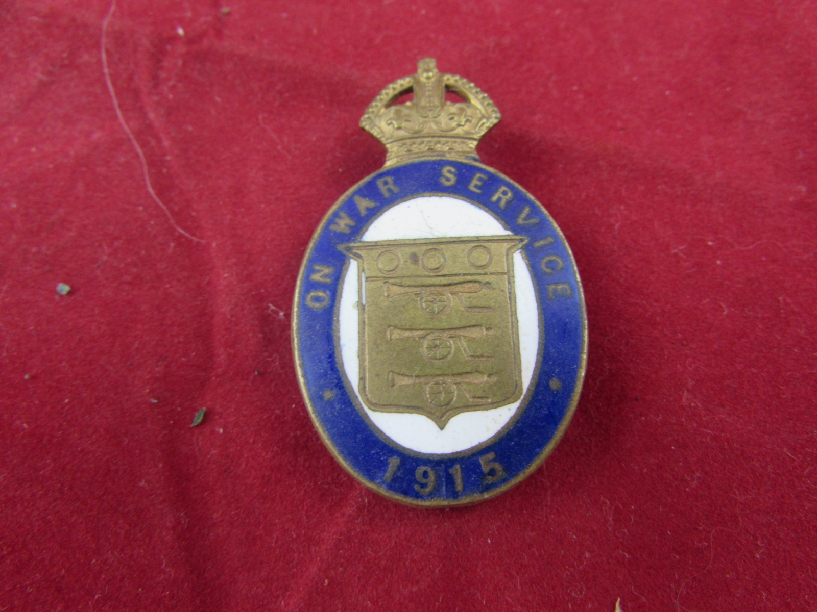 WW1 On War Service 1915, munition workers enamel badge.