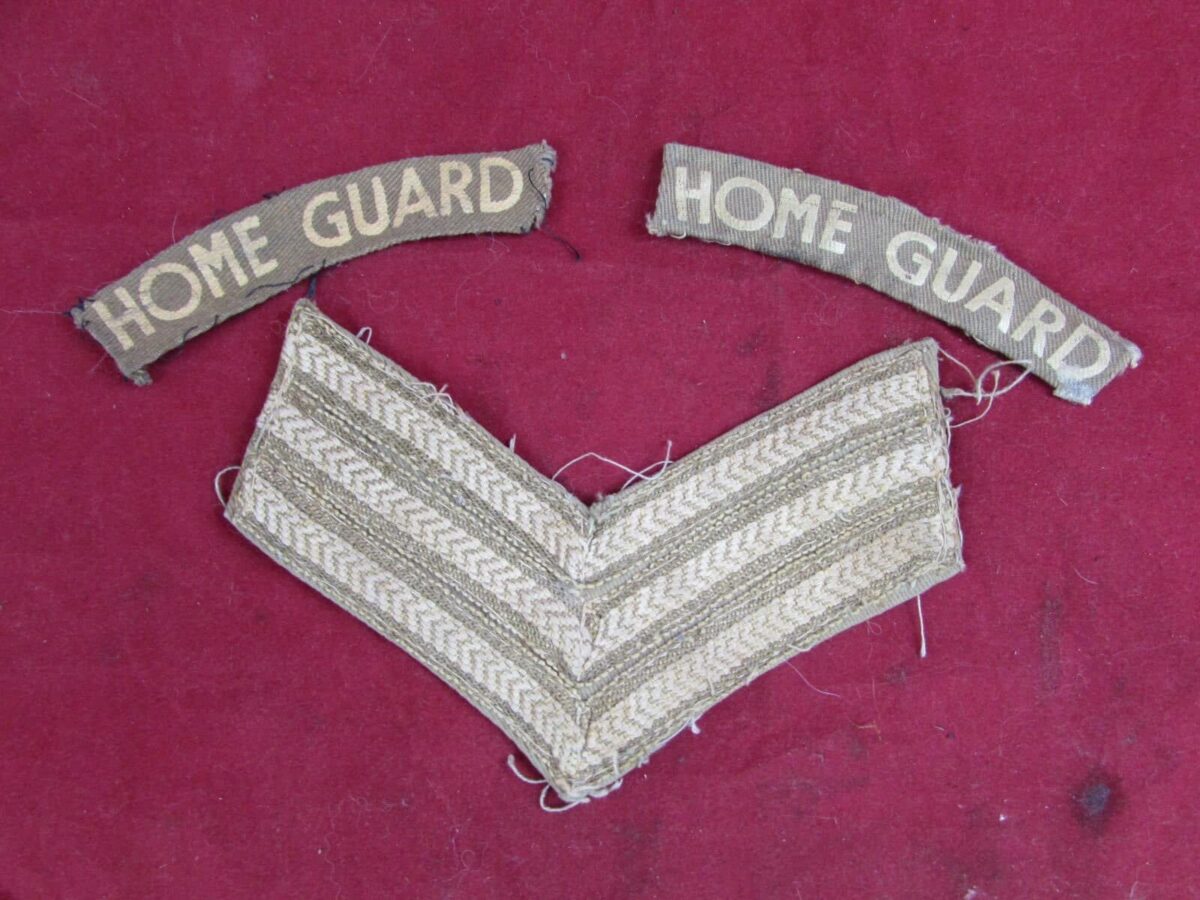 A WWII PRINTED HOME GUARD SHOULDER TITLES & STRIPES