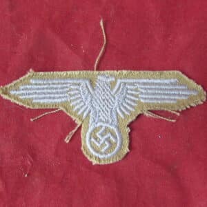 These tropical Heer breast eagles are considerably scarcer than the standard Army breast eagles intended for the familiar field-grey German Army uniform, making surviving original examples particularly desirable to collectors of German militaria, Afrika Korps uniforms and WWII tropical insignia.